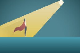 A spotlight falls on the superhero copywriter
