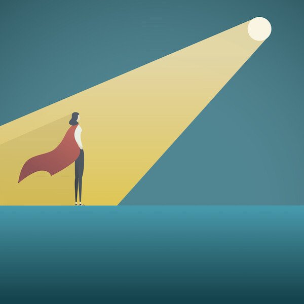 A spotlight falls on the superhero copywriter